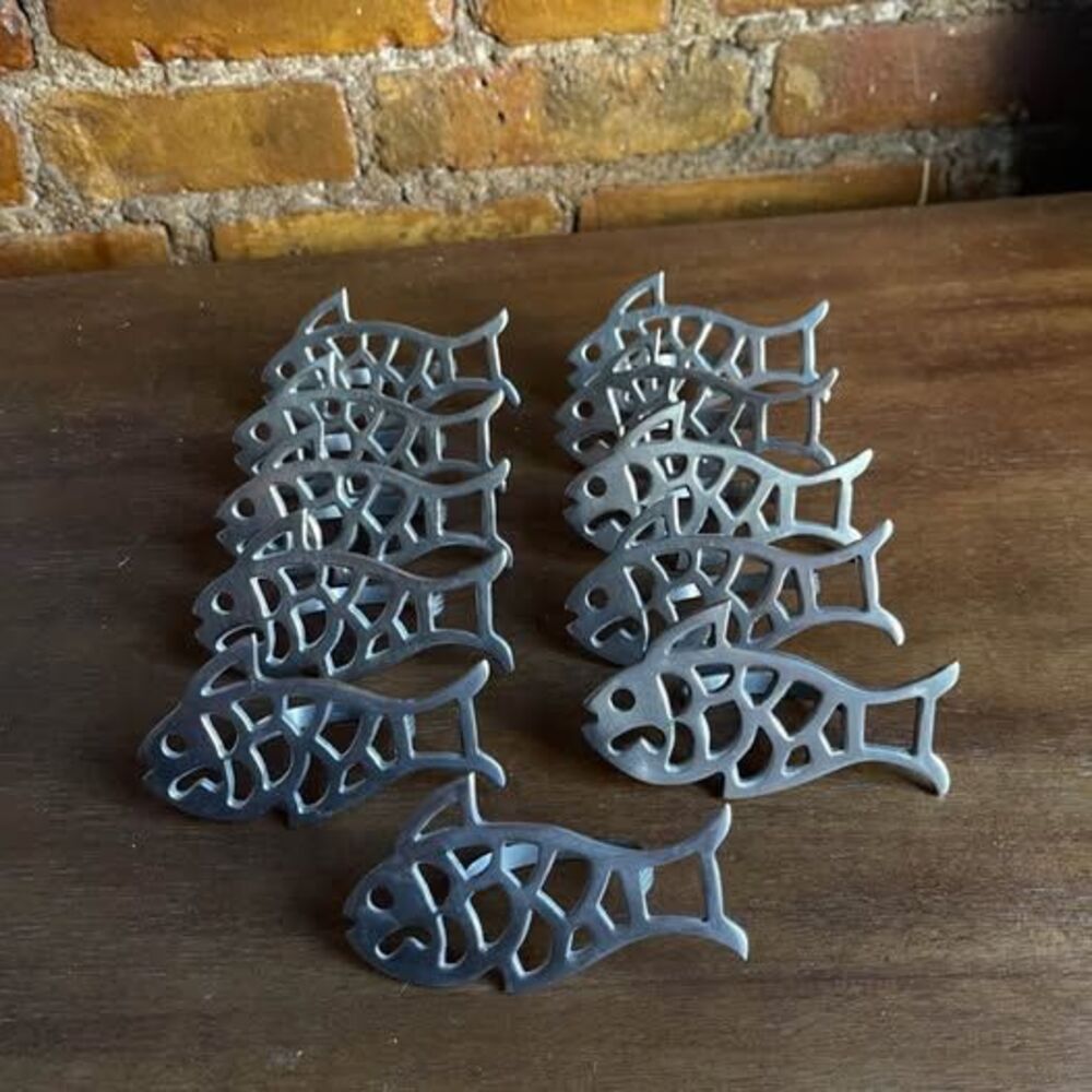Original metal napkin ring holders in the shape of silver fish, 11 pieces